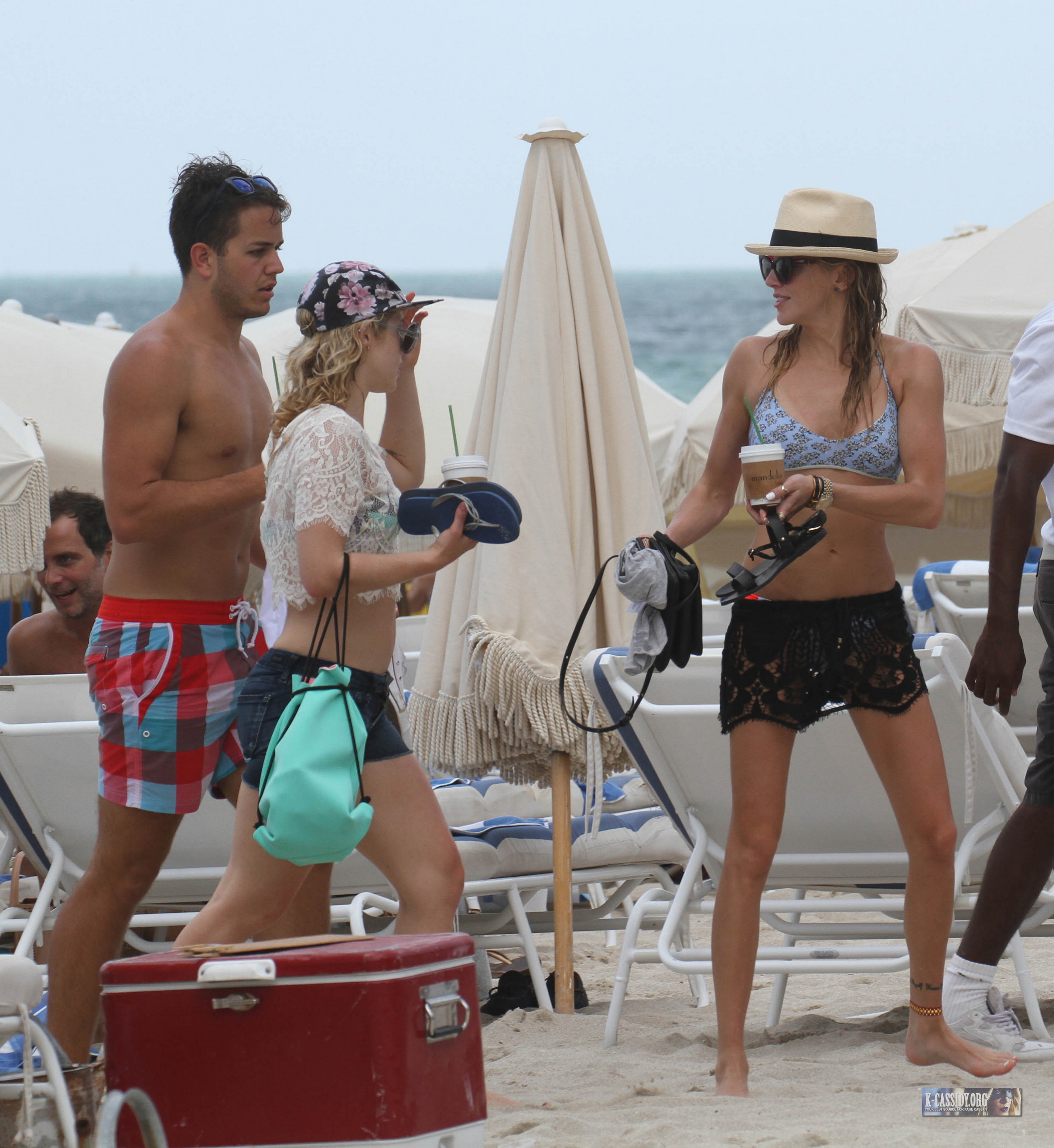 Emily Bett Rickards and Katie Cassidy wearing sexy bikini on the beach in Miami 24x UHQ 12.jpg