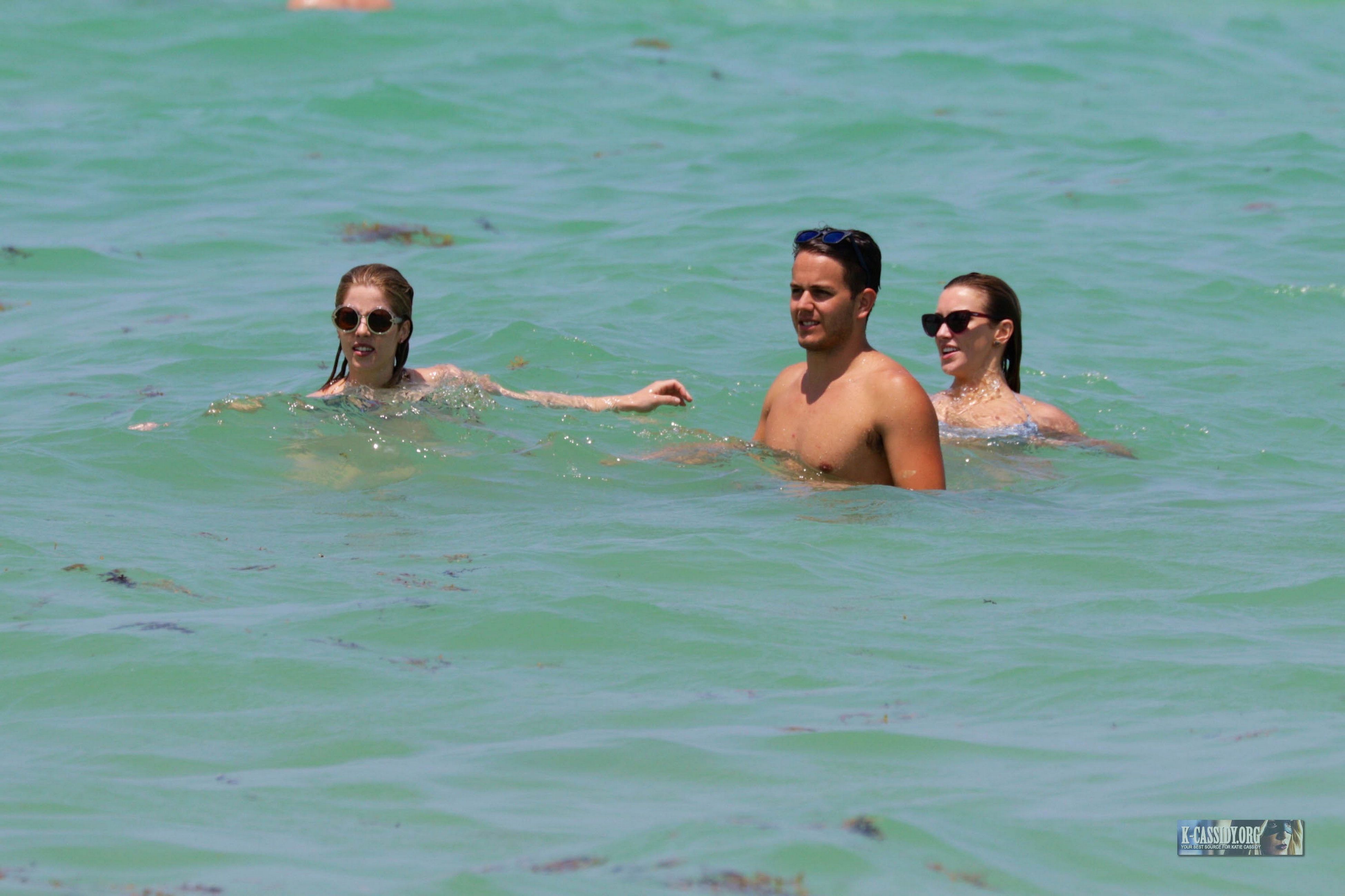 Emily Bett Rickards and Katie Cassidy wearing sexy bikini on the beach in Miami 24x UHQ 16.jpg