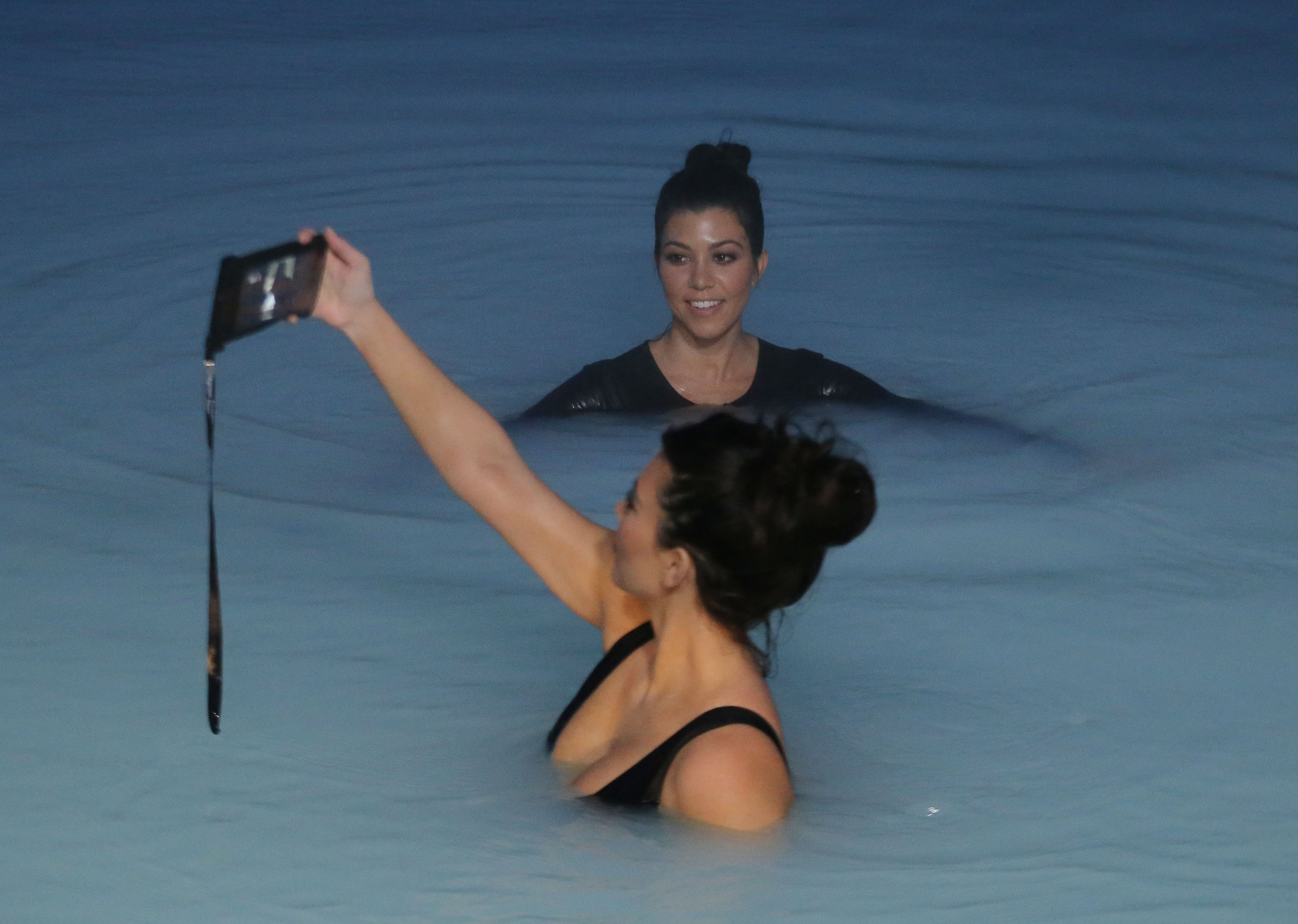 kim-kardashian-big-cleavage-in-swimsuit-in-iceland-14.jpg