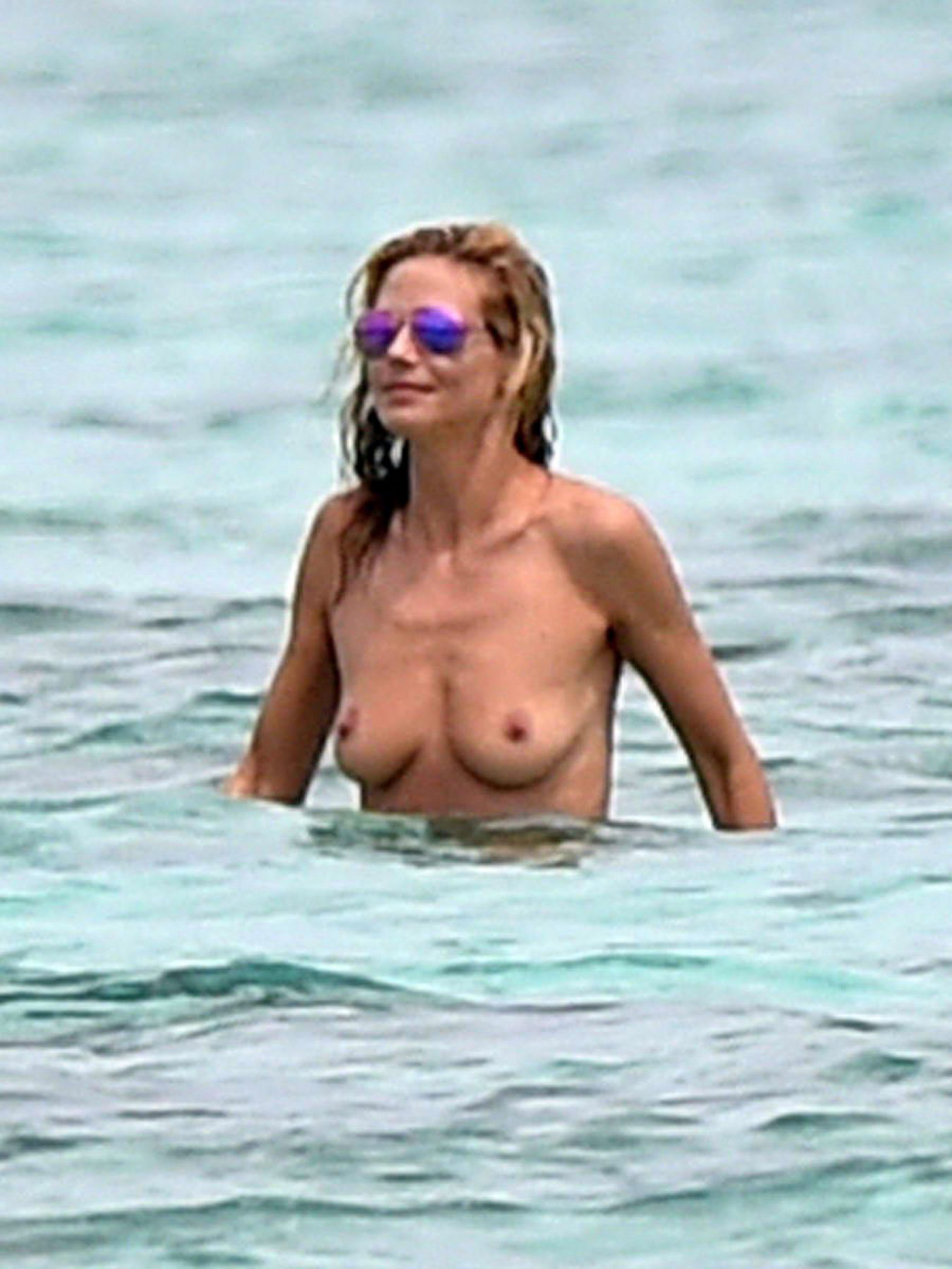 Heidi Klum topless on the beach in France 8x HQ photos 12.jpg