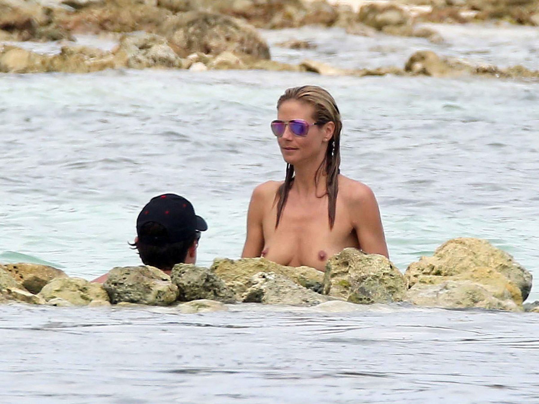 Heidi Klum topless on the beach in France 8x HQ photos 9.jpg