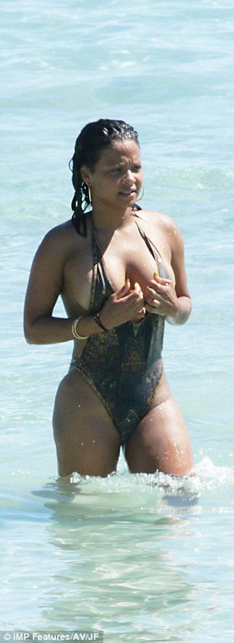 Christina Milian nip slip in tight swimsuit on the beach in Ibiza MixQ 15.jpg