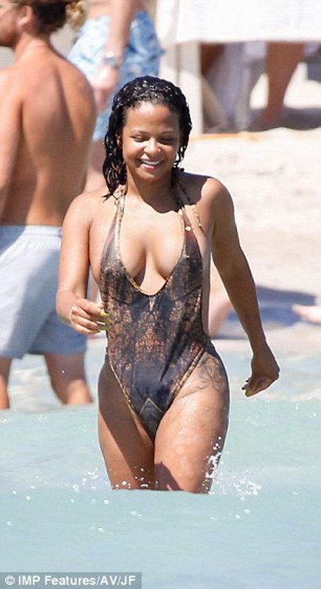 Christina Milian nip slip in tight swimsuit on the beach in Ibiza MixQ 8.jpg