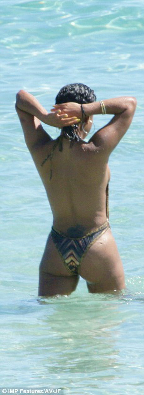Christina Milian nip slip in tight swimsuit on the beach in Ibiza MixQ 14.jpg