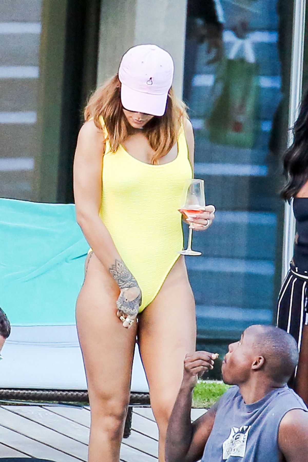 rihanna-in-swimsuit-at-pool-at-her-hotel-in-zurich-08-13-2016_3.jpg