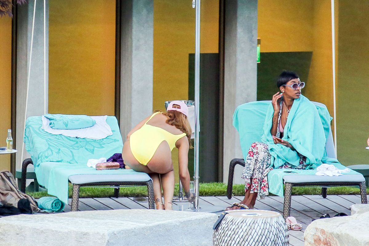 rihanna-in-swimsuit-at-pool-at-her-hotel-in-zurich-08-13-2016_22.jpg