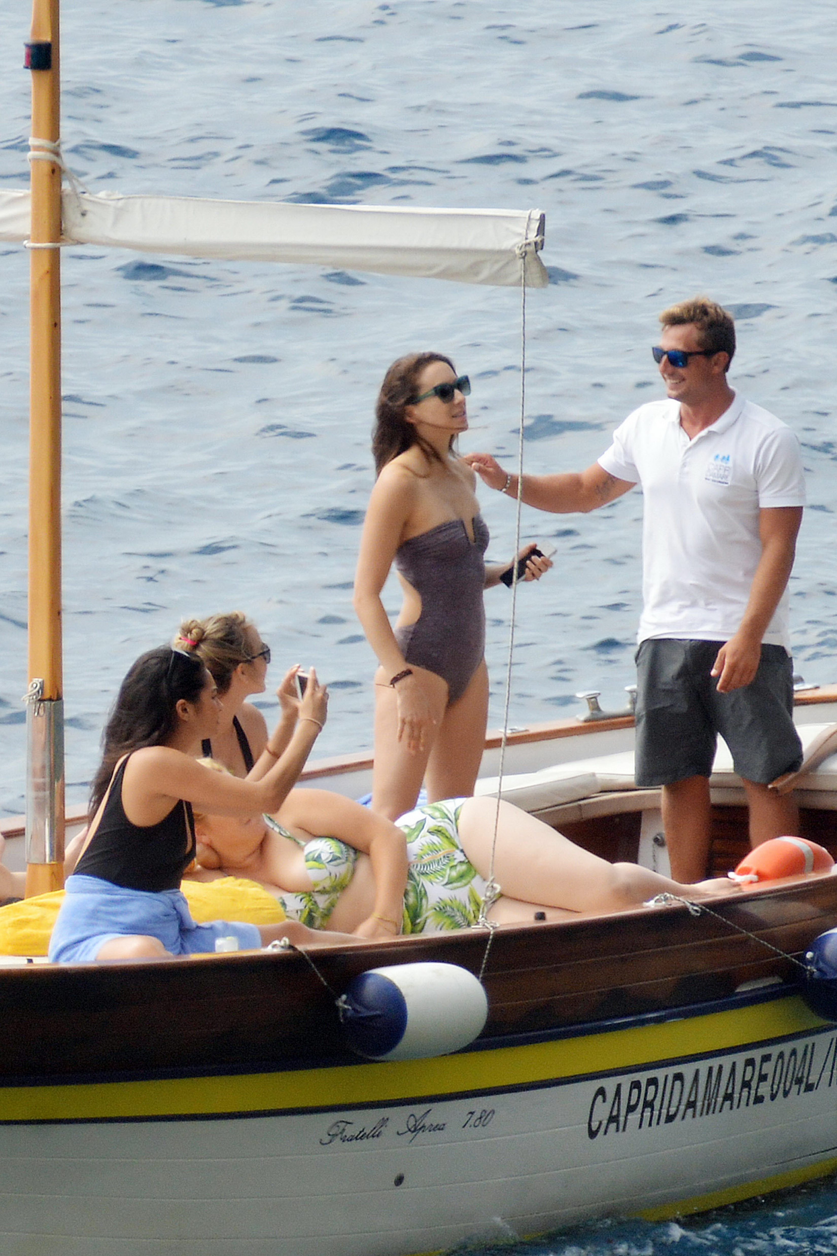 Ashley Benson, Shay Mitchell & Troian Bellisario sexy bikinis and swimsuits candids on the yacht in Capri 37x HQ photos 22.jpg