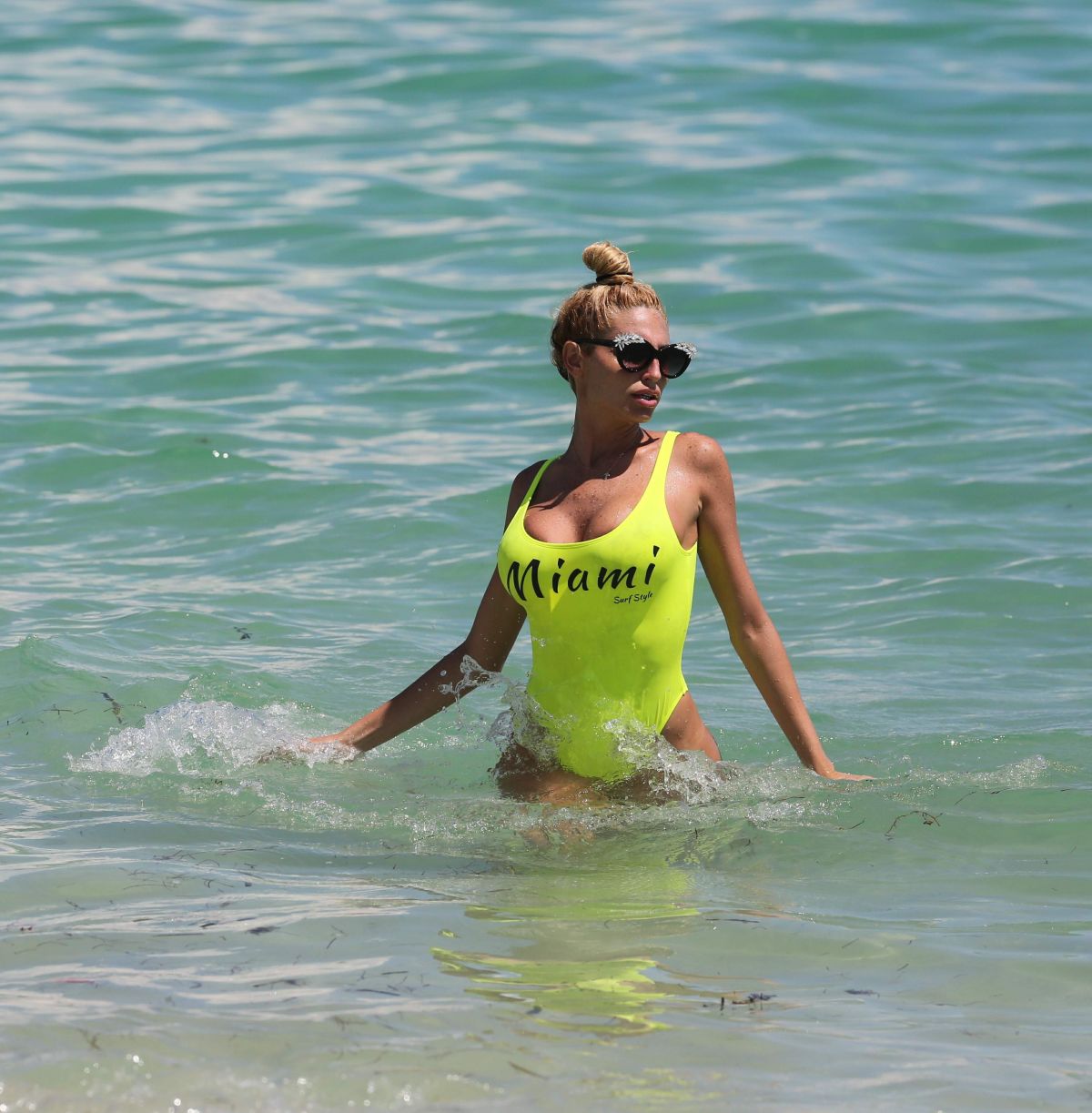 vicky-zipolitakis-in-yellow-swimsuit-at-a-beach-in-miami-09-21-2016_29.jpg