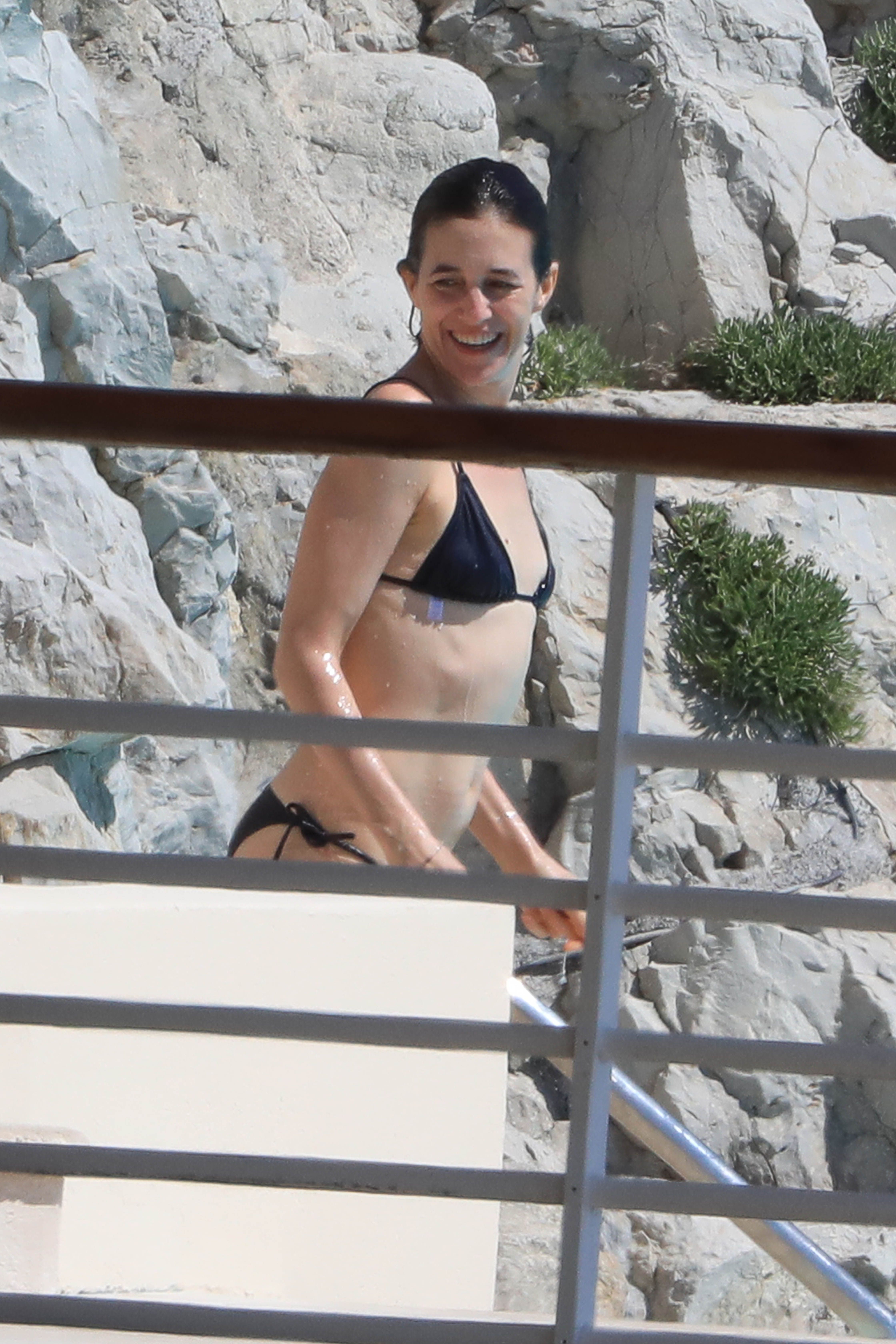 Charlotte Gainsbourg nip slip boobs pop out from bikini in the pool in Cannes 27x HQ photos 11.jpg