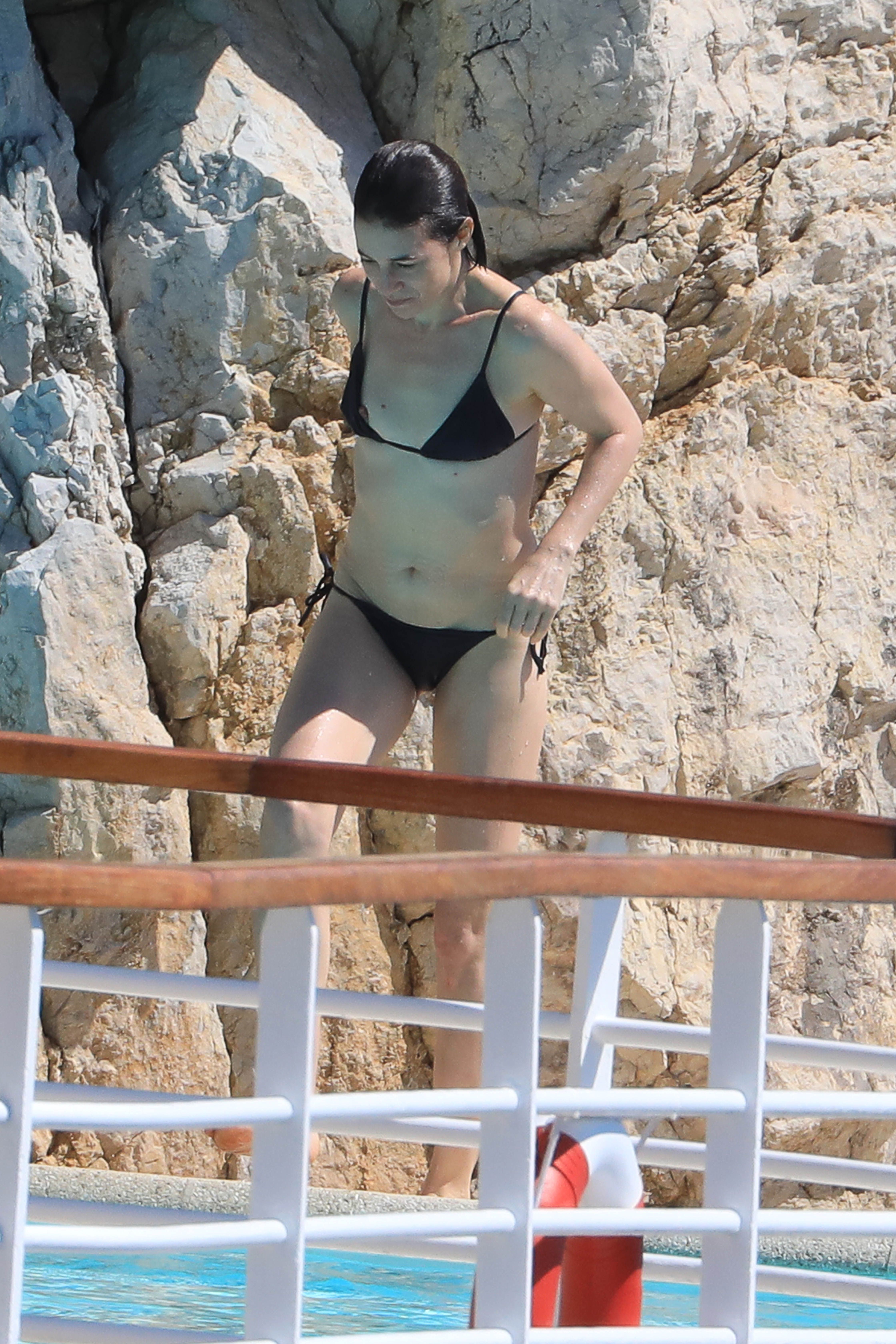 Charlotte Gainsbourg nip slip boobs pop out from bikini in the pool in Cannes 27x HQ photos 28.jpg
