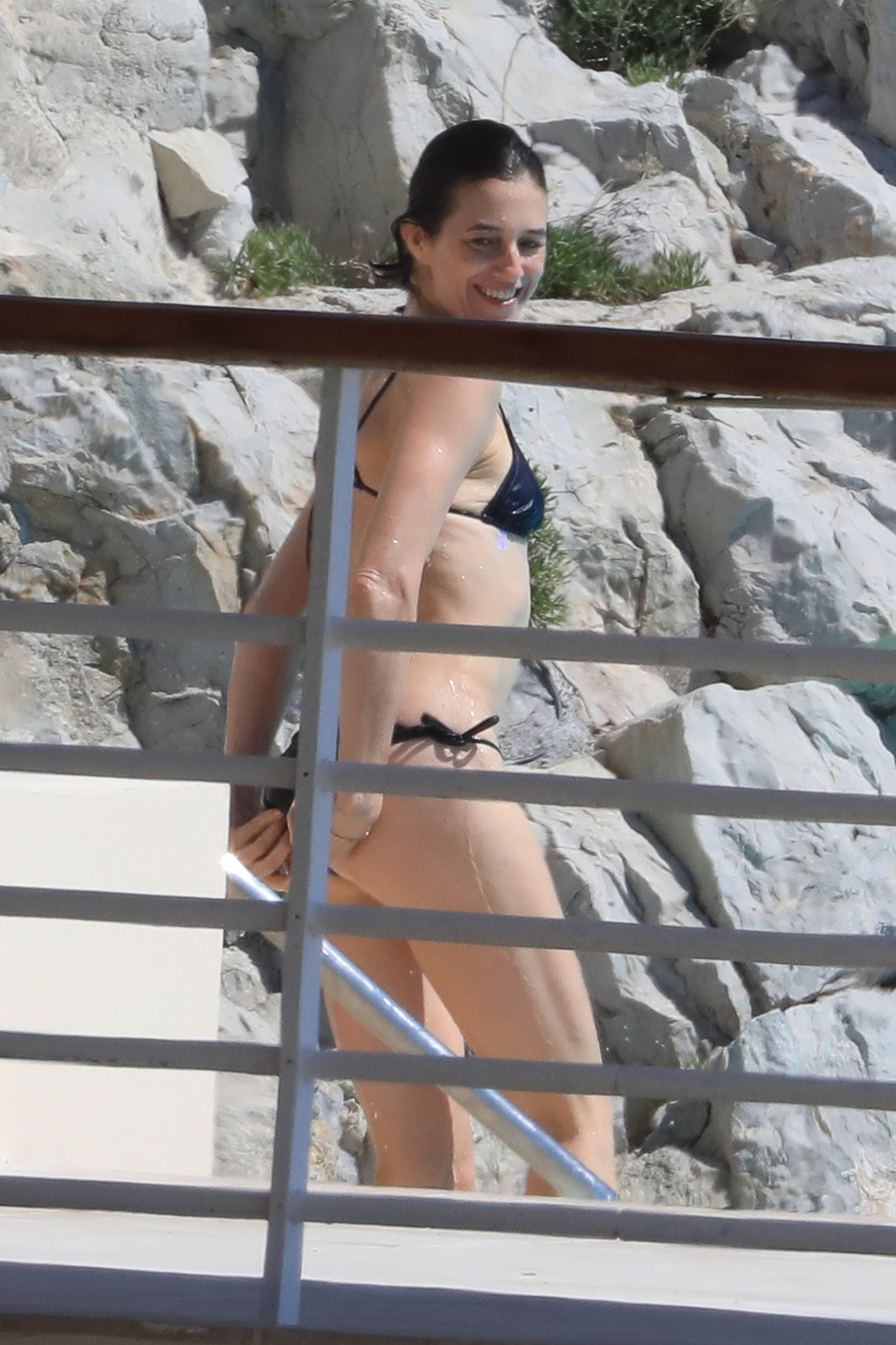 Charlotte Gainsbourg nip slip boobs pop out from bikini in the pool in Cannes 27x HQ photos 10.jpg