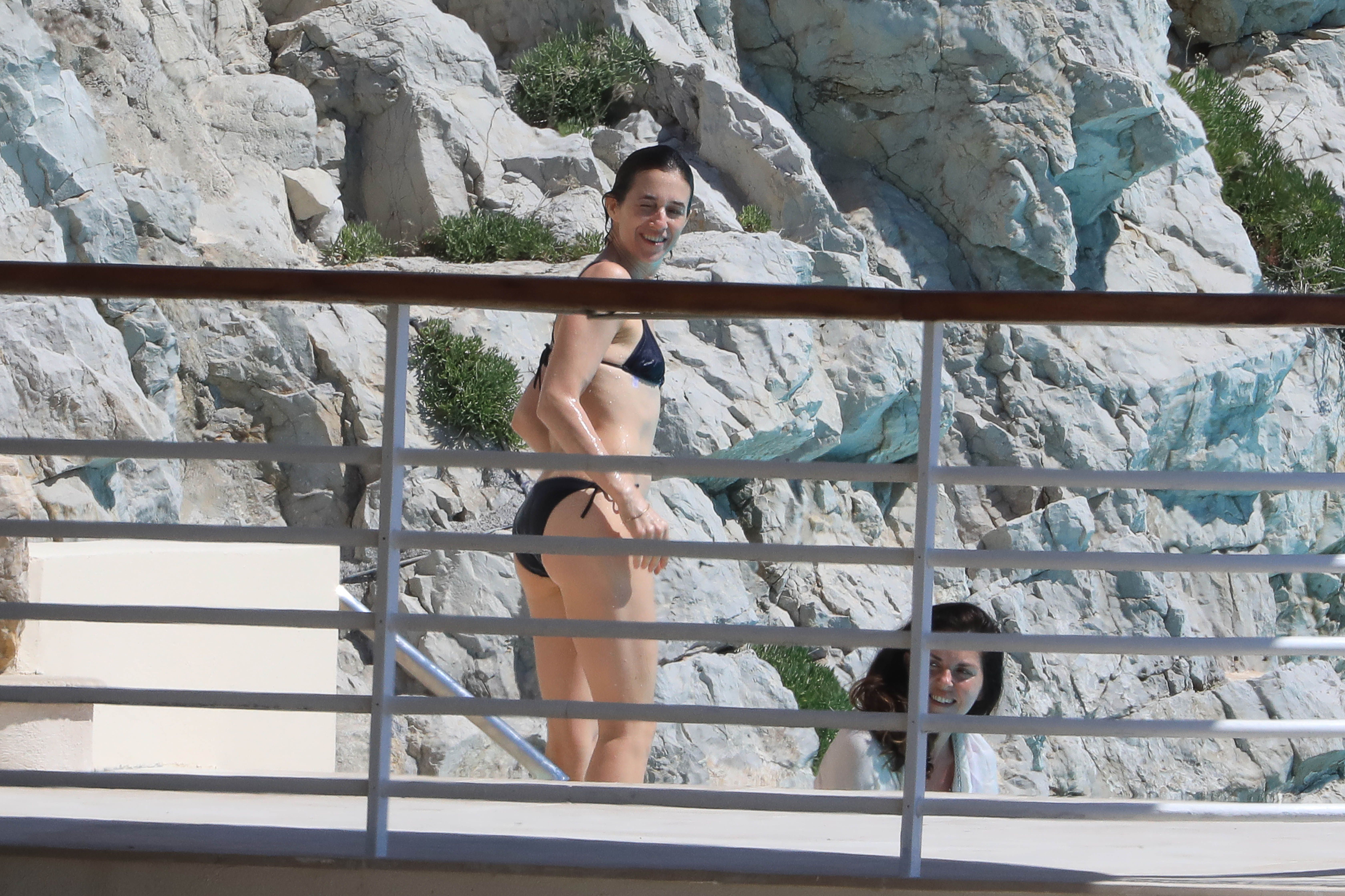 Charlotte Gainsbourg nip slip boobs pop out from bikini in the pool in Cannes 27x HQ photos 12.jpg